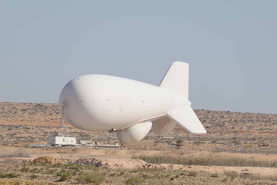 Aerostat hovering above a dessert landcsape